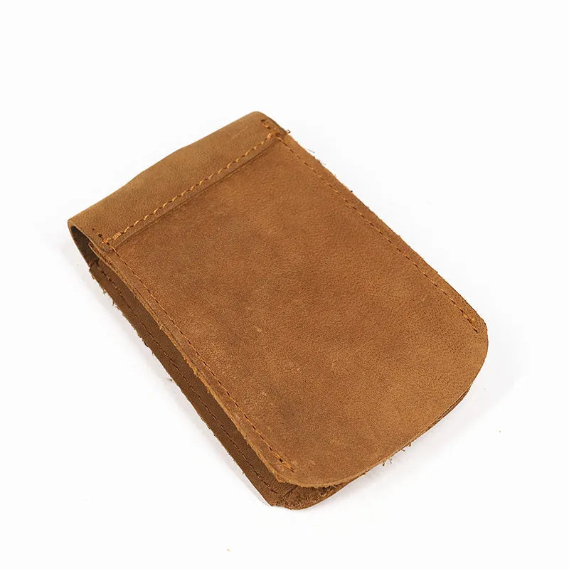 Crazy horse leather key case in dark brown, 7cm by 11.5cm, resting on a surface