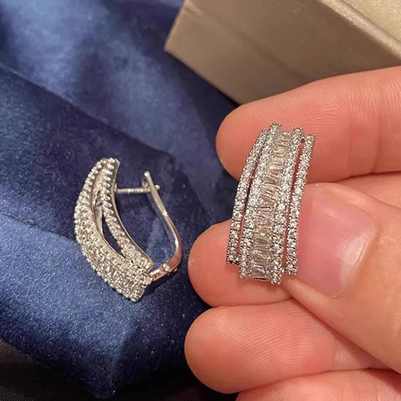 Geometric white gold colour stud earrings with zircon stone detail for women
