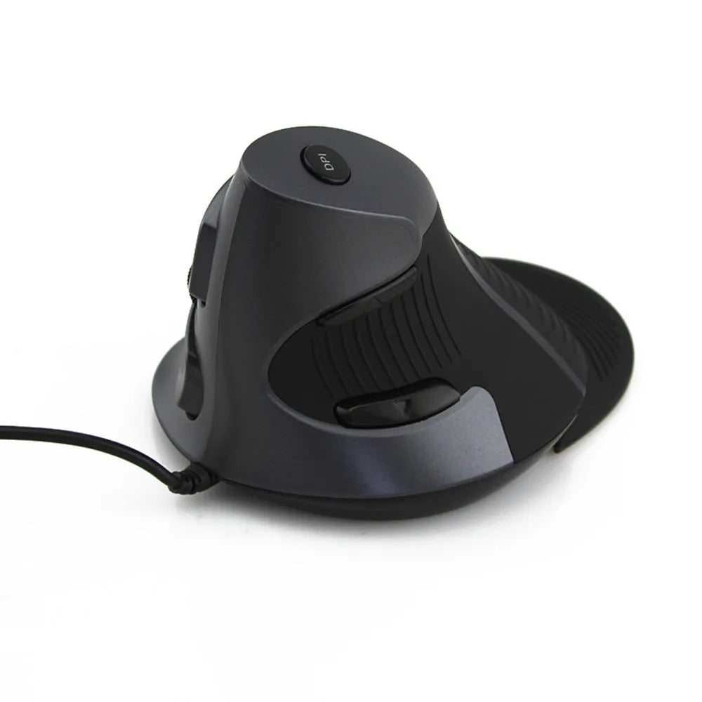 Black and white wired vertical ergonomic mouse for desktop computers on a desk.