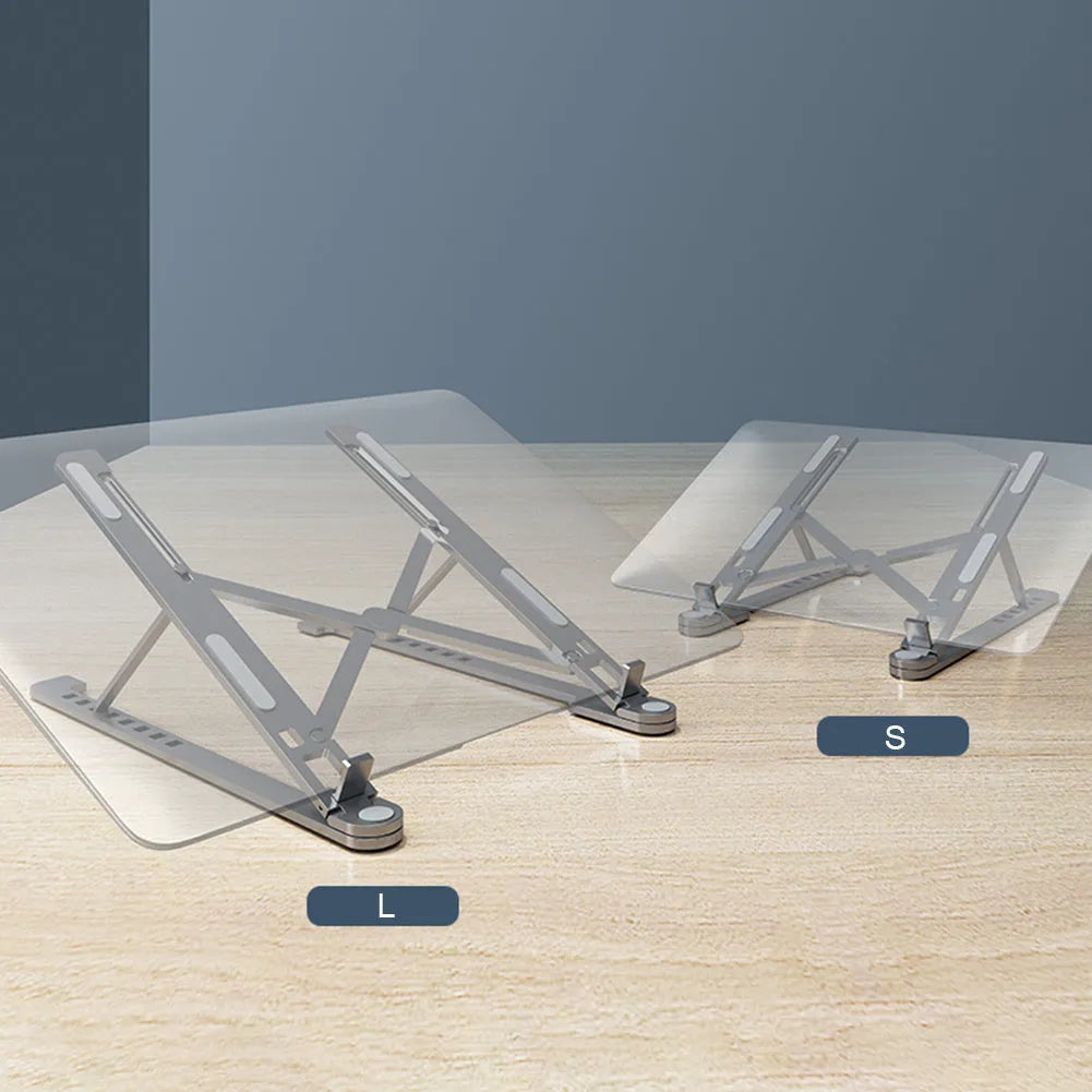 Aluminium foldable laptop stand in silver colour set to medium height with a laptop on top.