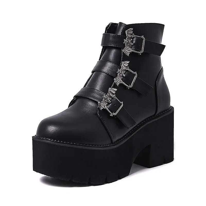 Black women's punk ankle boots with bat buckle and side zip, thick platform heel