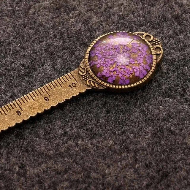 Handmade dried gypsophila flower bookmark ruler showing lace flowers, daffodils, and clovers on 12cm length