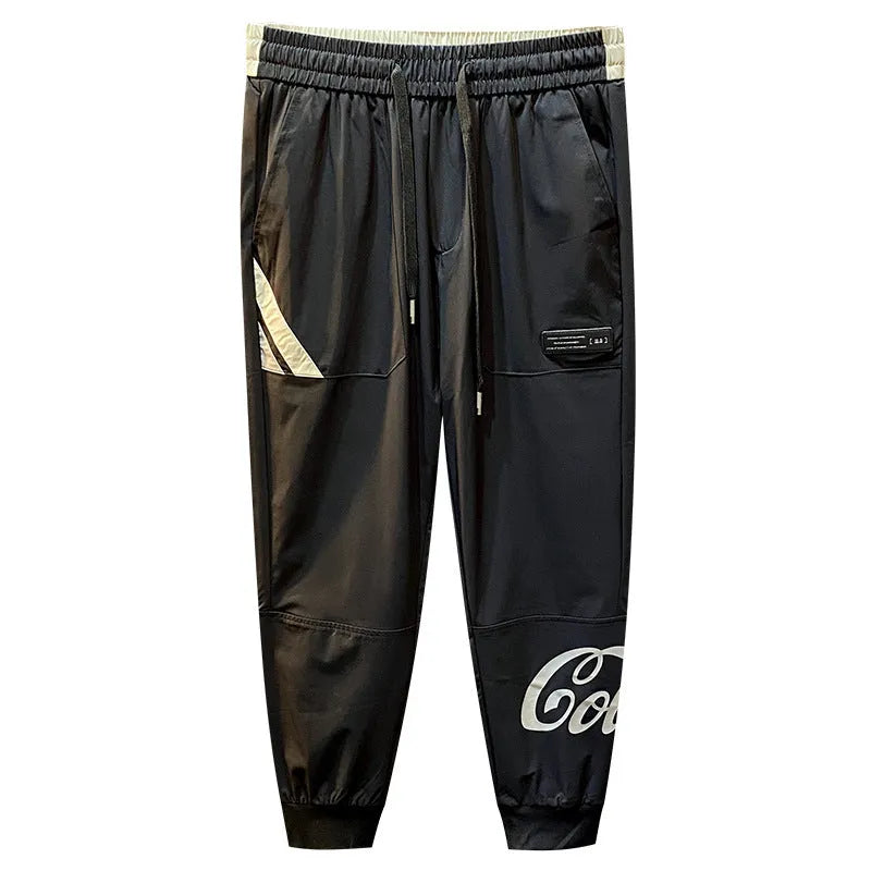 Black men's cropped casual trousers with ankle banding made from ultra-thin ice silk cotton fabric.