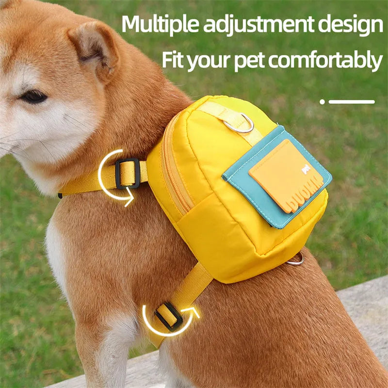 Blue adjustable dog backpack harness with breathable mesh and detachable tow rope on medium-sized dog
