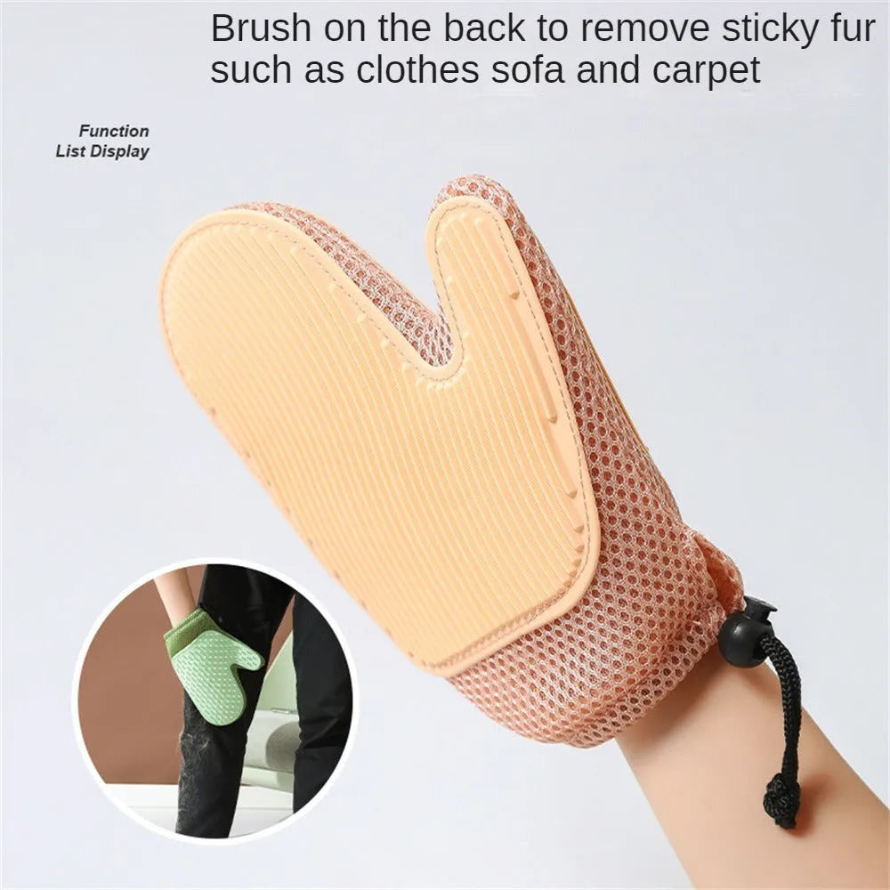 A dark blue pet hair removal glove with mesh fabric and TPR grips for grooming cats and dogs.