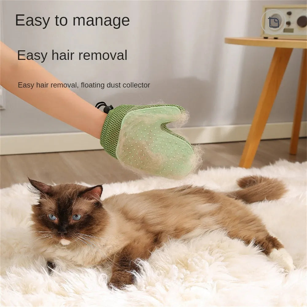 A dark blue pet hair removal glove with mesh fabric and TPR grips for grooming cats and dogs.