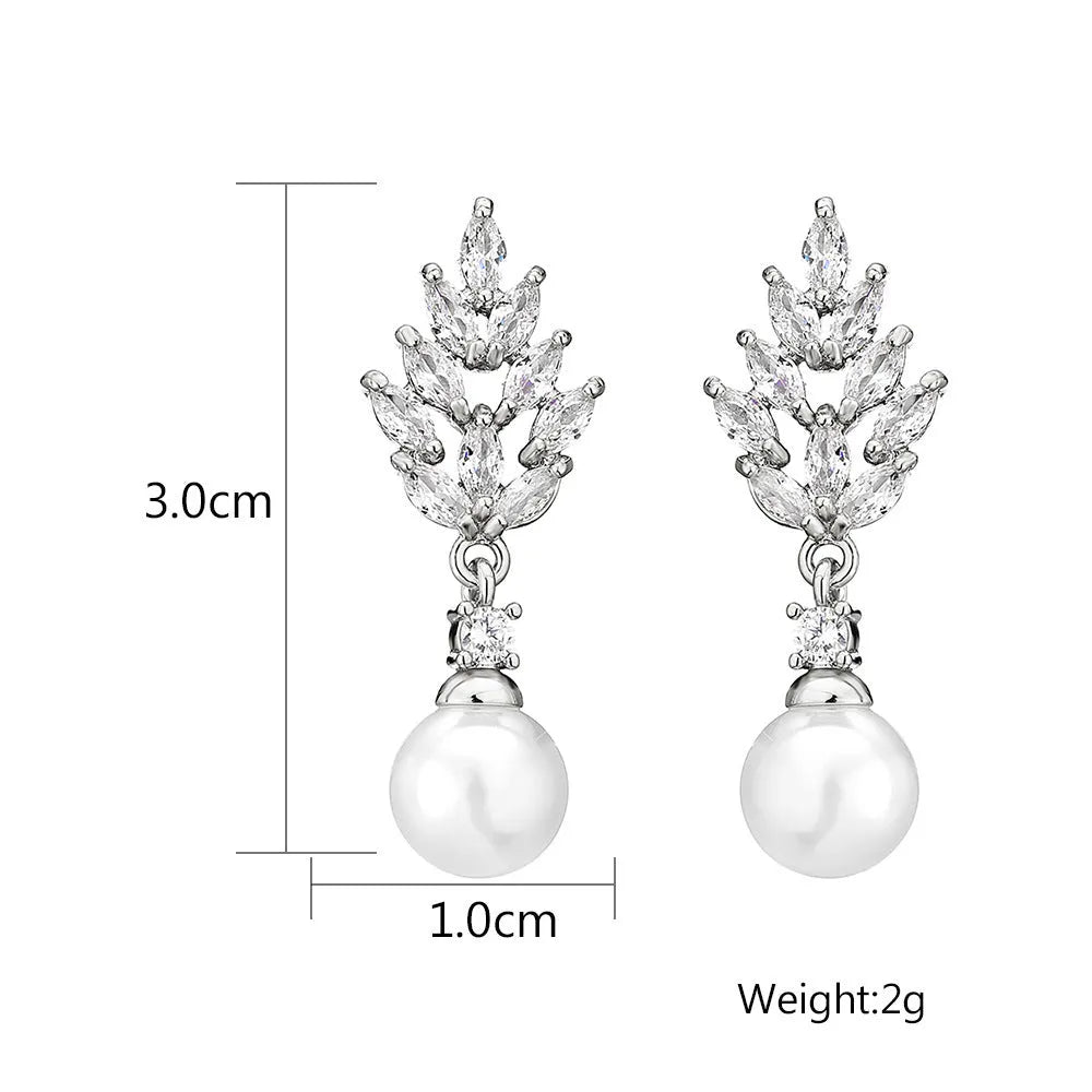 Geometric pearl earrings with micro inlaid zircon detailing and floral design in metallic plating