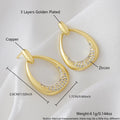 Geometric drop-shaped women's earrings in yellow gold colour with zircon design elements