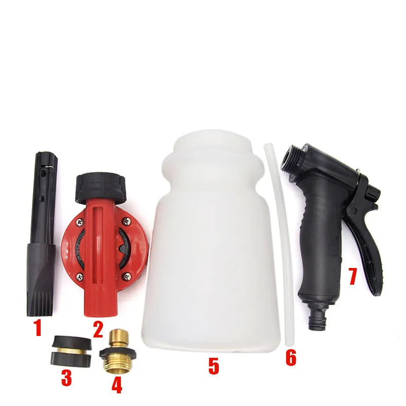 A grey foam pot high pressure water gun for garden use on a wooden surface.