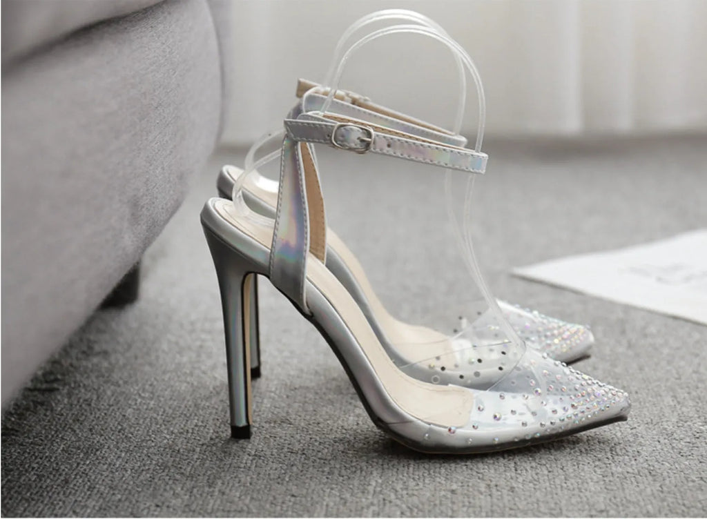 Women's pointed toe stiletto sandals with diamond embellishments on PVC upper, showing side view