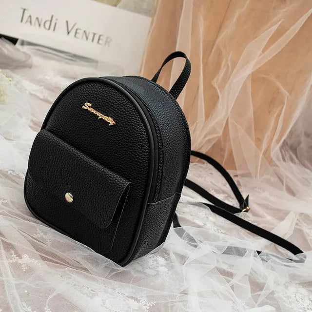 Women's small PU shoulder backpack purse in multiple colours with zipper closure