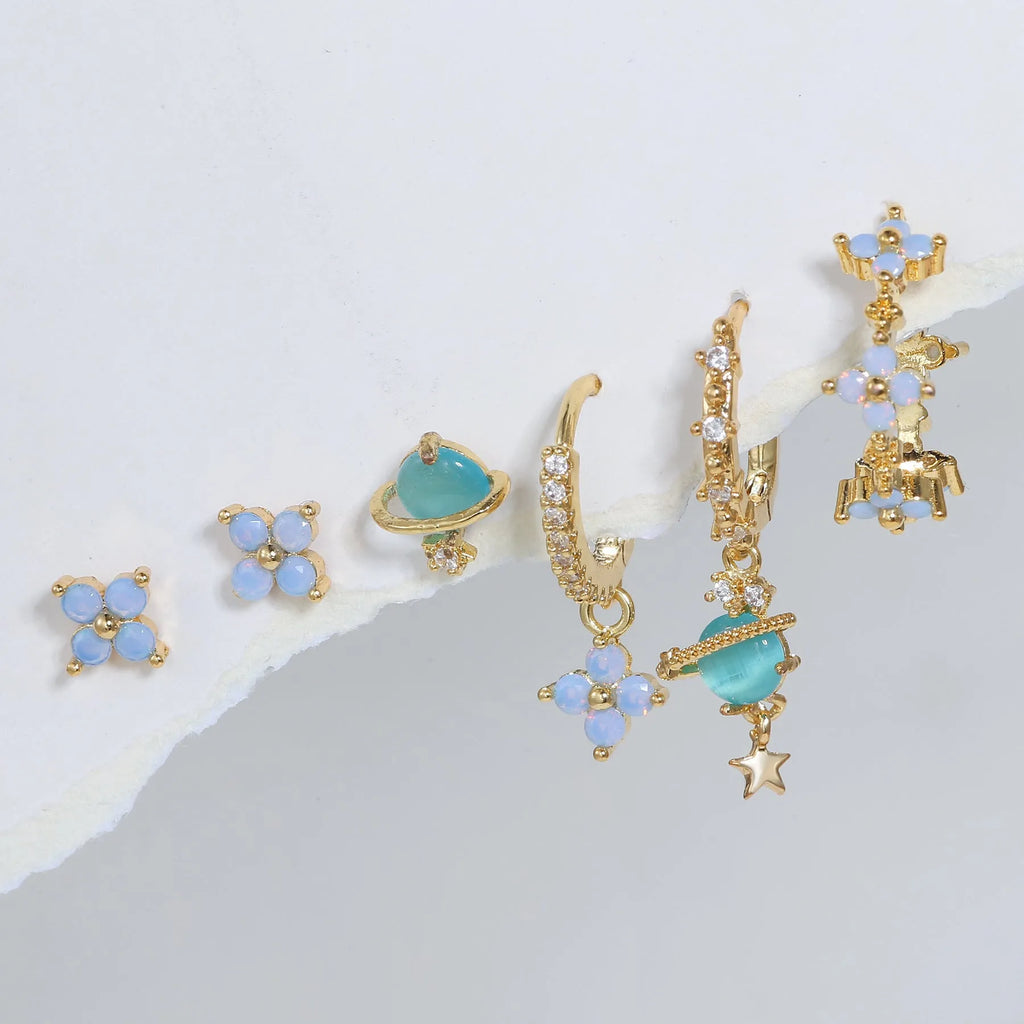 Gold and silver floral ear studs with zircon mosaic stones and geometric metal design