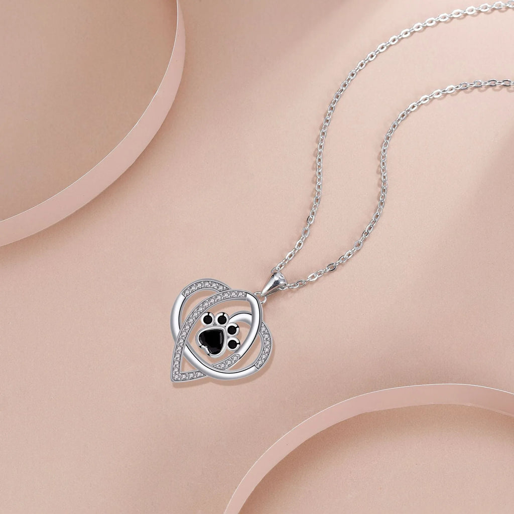 Copper necklace with dog and cat paw print pendant on cross chain