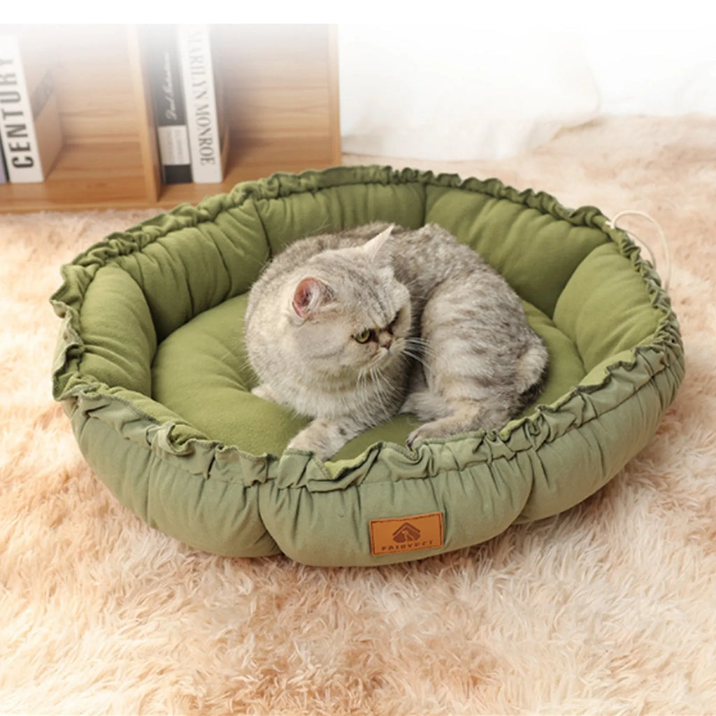 Gray and green reversible donut cat bed for indoor cats, shown in small, medium, and large sizes.