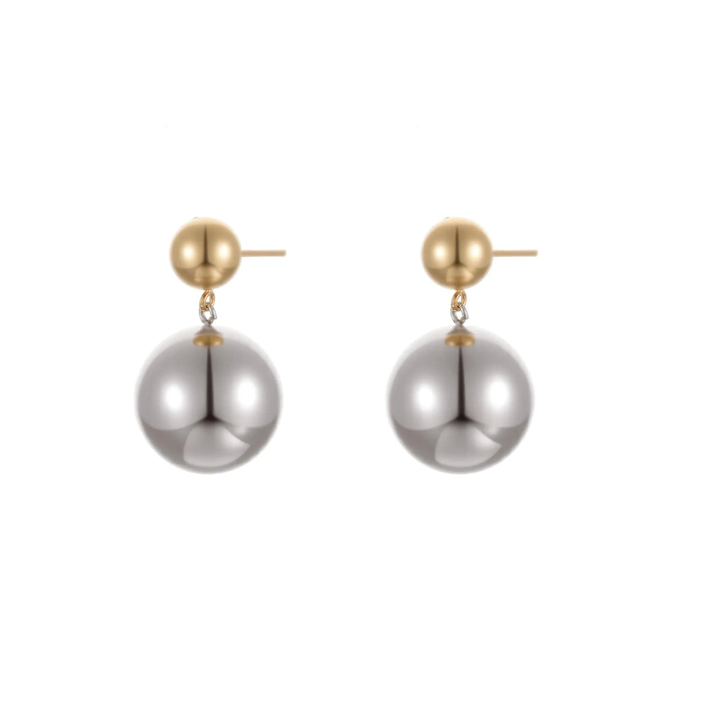 Stainless steel geometric ear studs with round beads and colour-block electroplated finish.