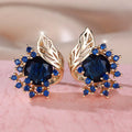 Round flower feather design earrings with champagne gold setting and coloured zircon stones.