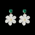 A pair of dark green alloy drop earrings with a floral design and clip-on fittings.