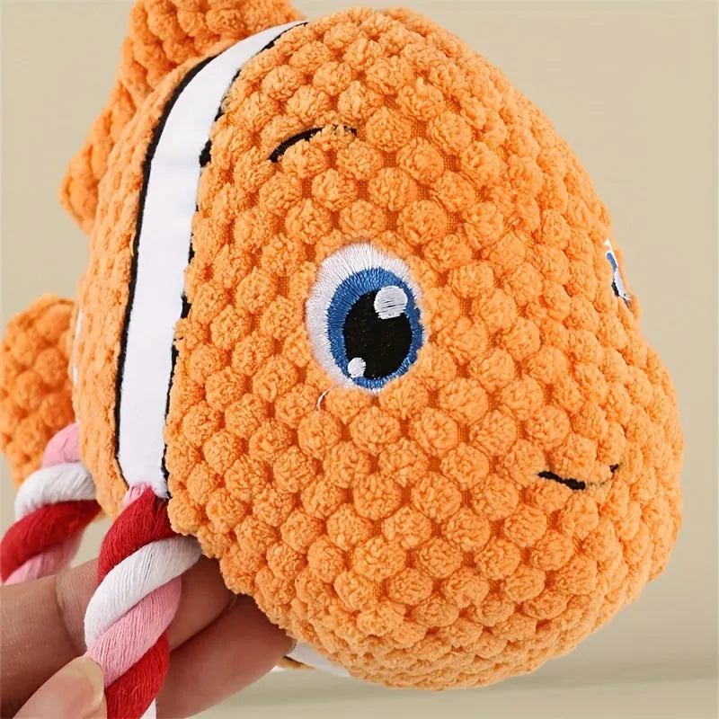 Turtle-shaped natural rubber dog chewing toy with knotted details in grey colour