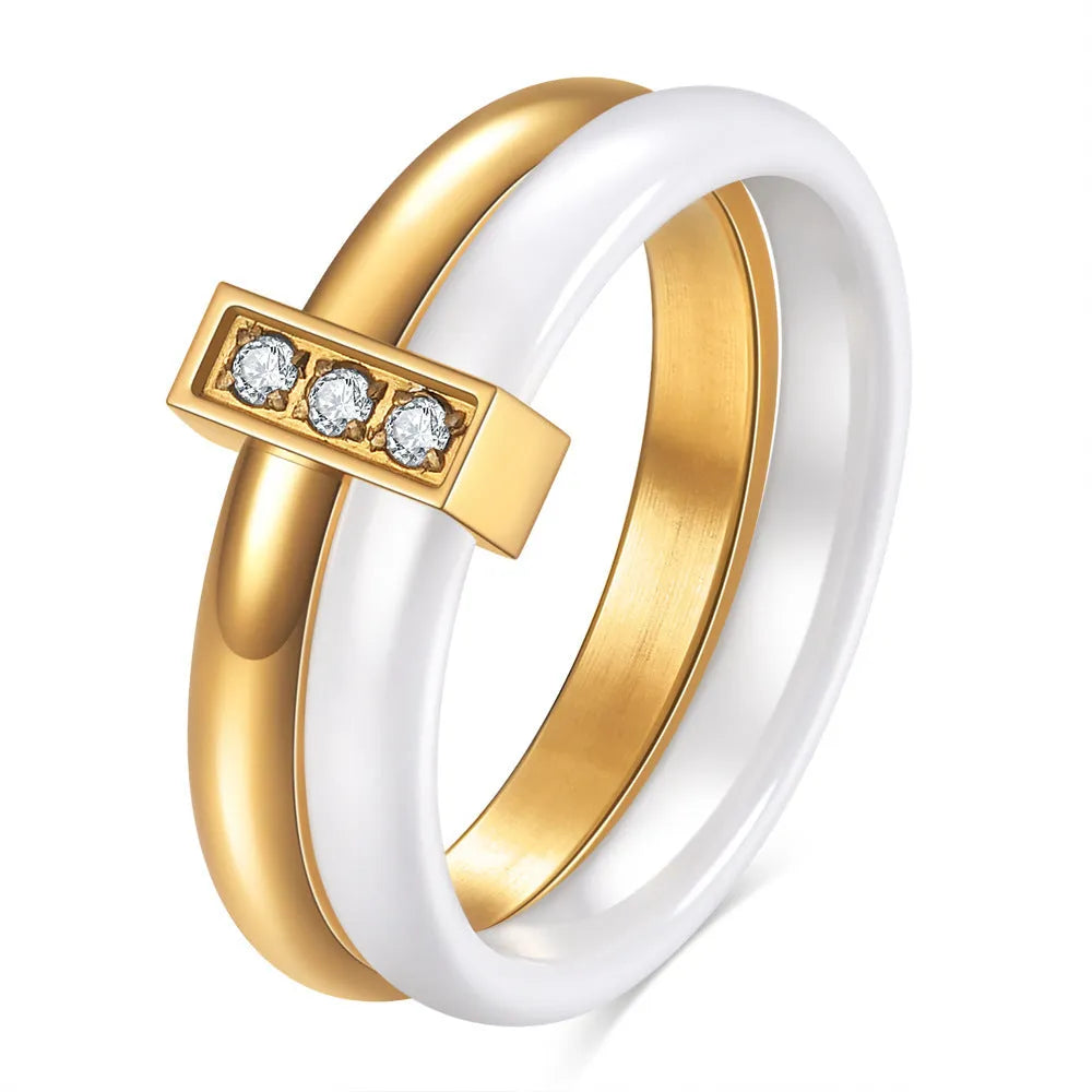 Ceramic ring with glossy stitching and zirconium detail in steel black or gold white finish