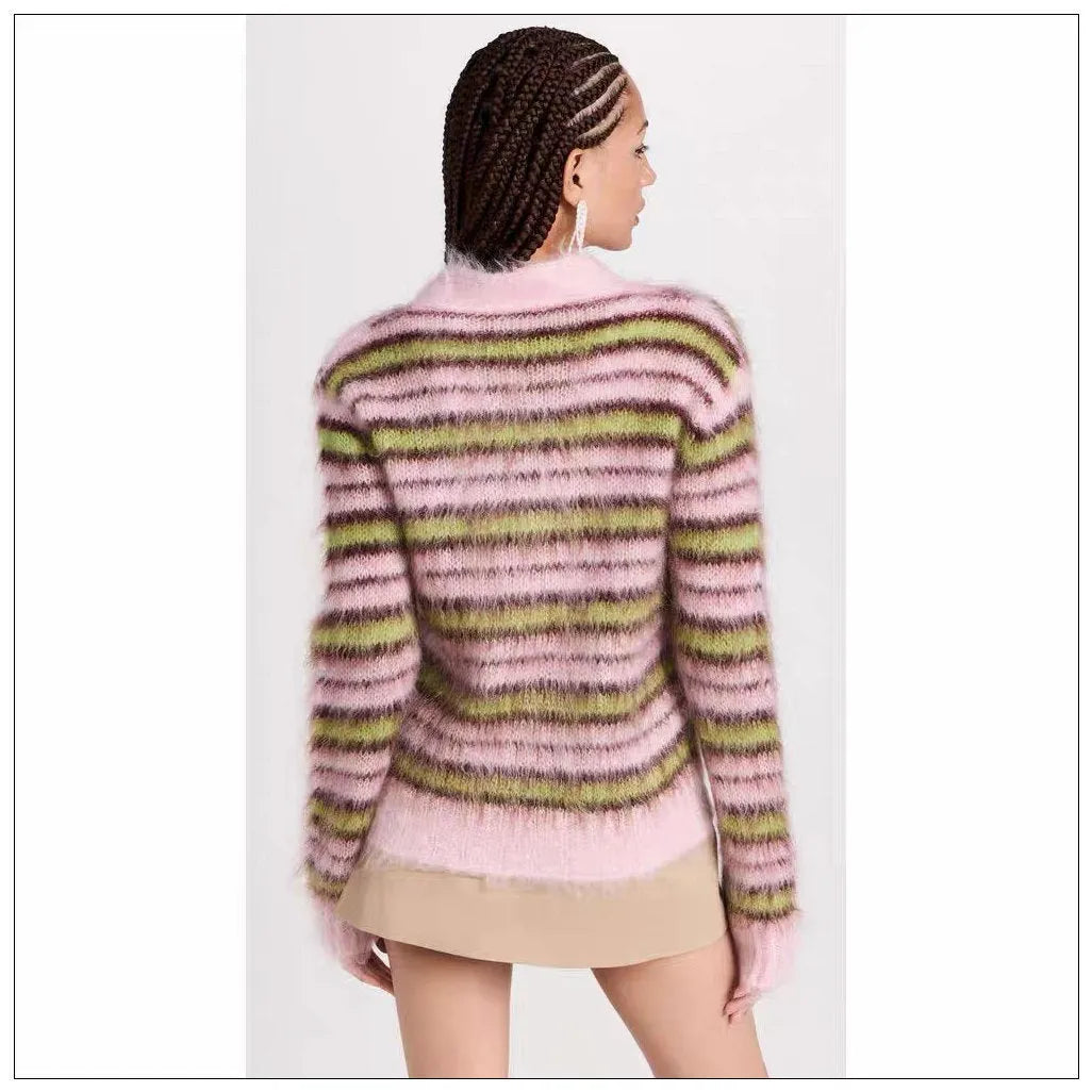 Pink women's wool knitted cardigan and pullover sweater with contrast colour detail on hanger