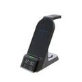 Black multifunctional alarm clock with wireless charging station for phone, Apple Watch, and earbuds