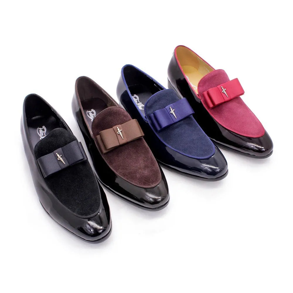 Men's low-top leather shoes in black with a tassel detail and glossy patent leather accents.