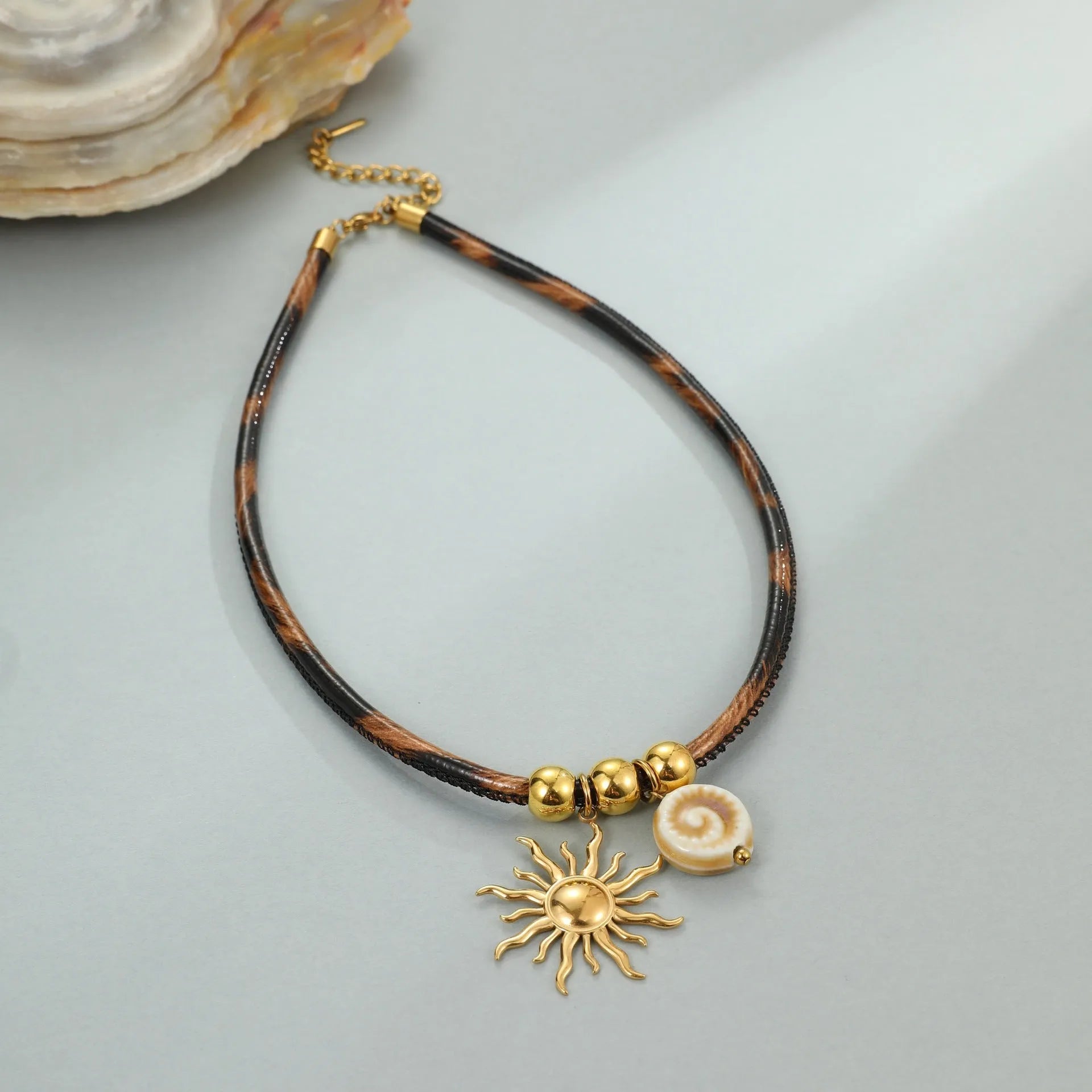 Leopard print geometric pendant necklace on stainless steel chain with gold plating