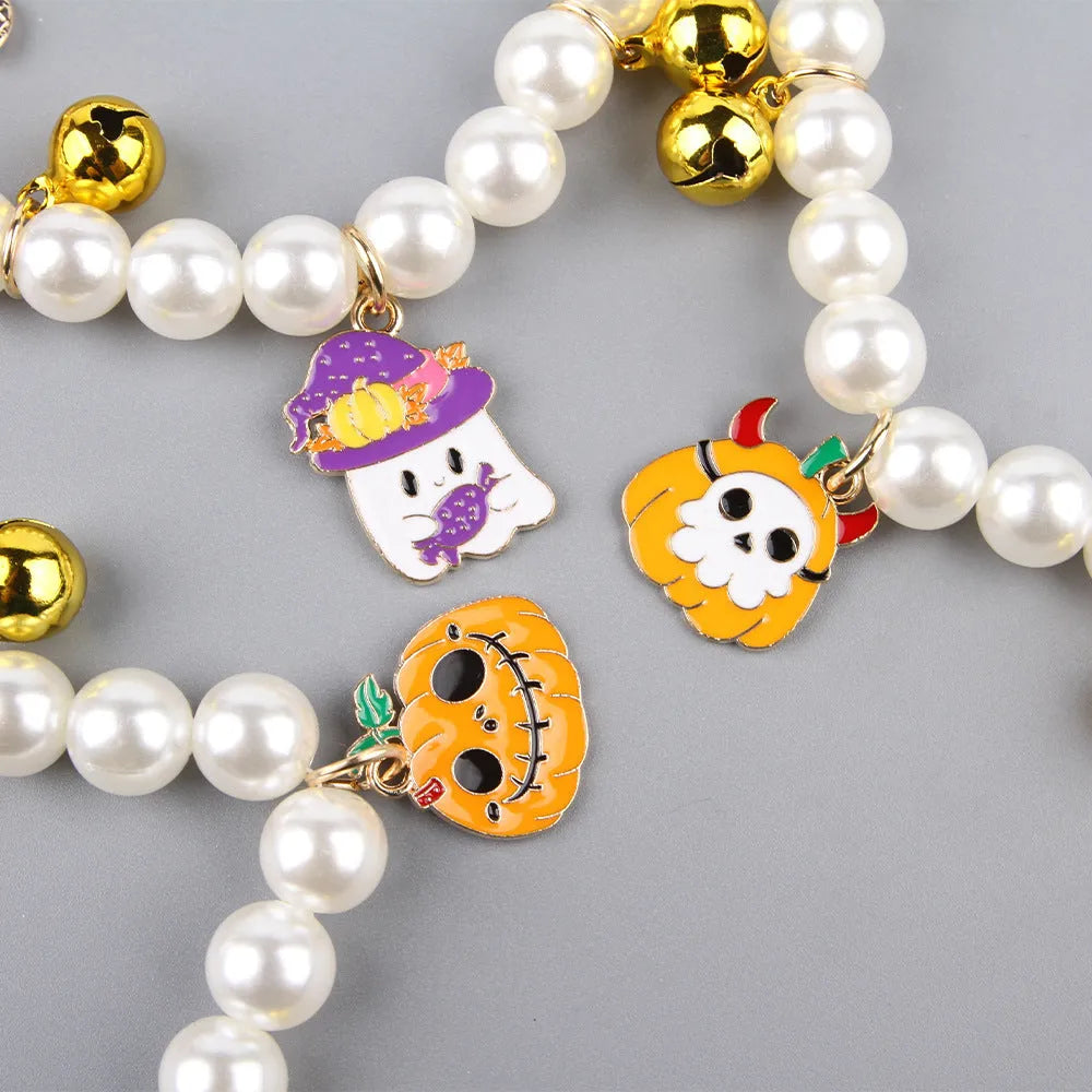 Purple Halloween cat collar with simulated pearl necklace and pumpkin ghost design for pets