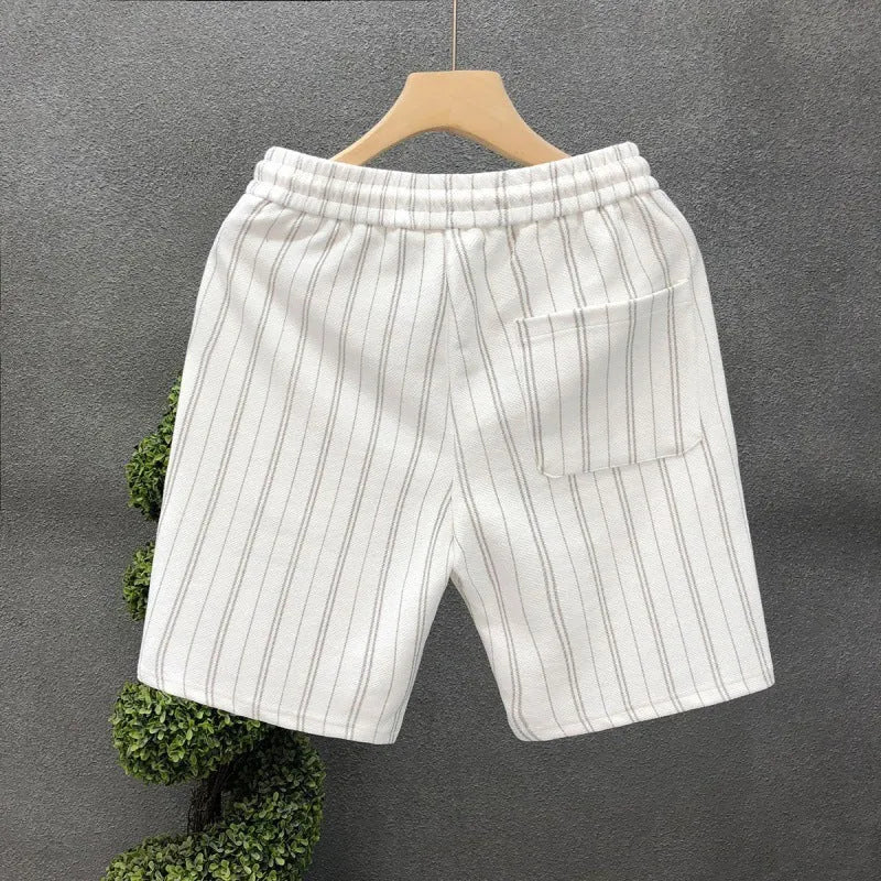 Men's black and white striped casual shorts with straight cut and ankle banded hem