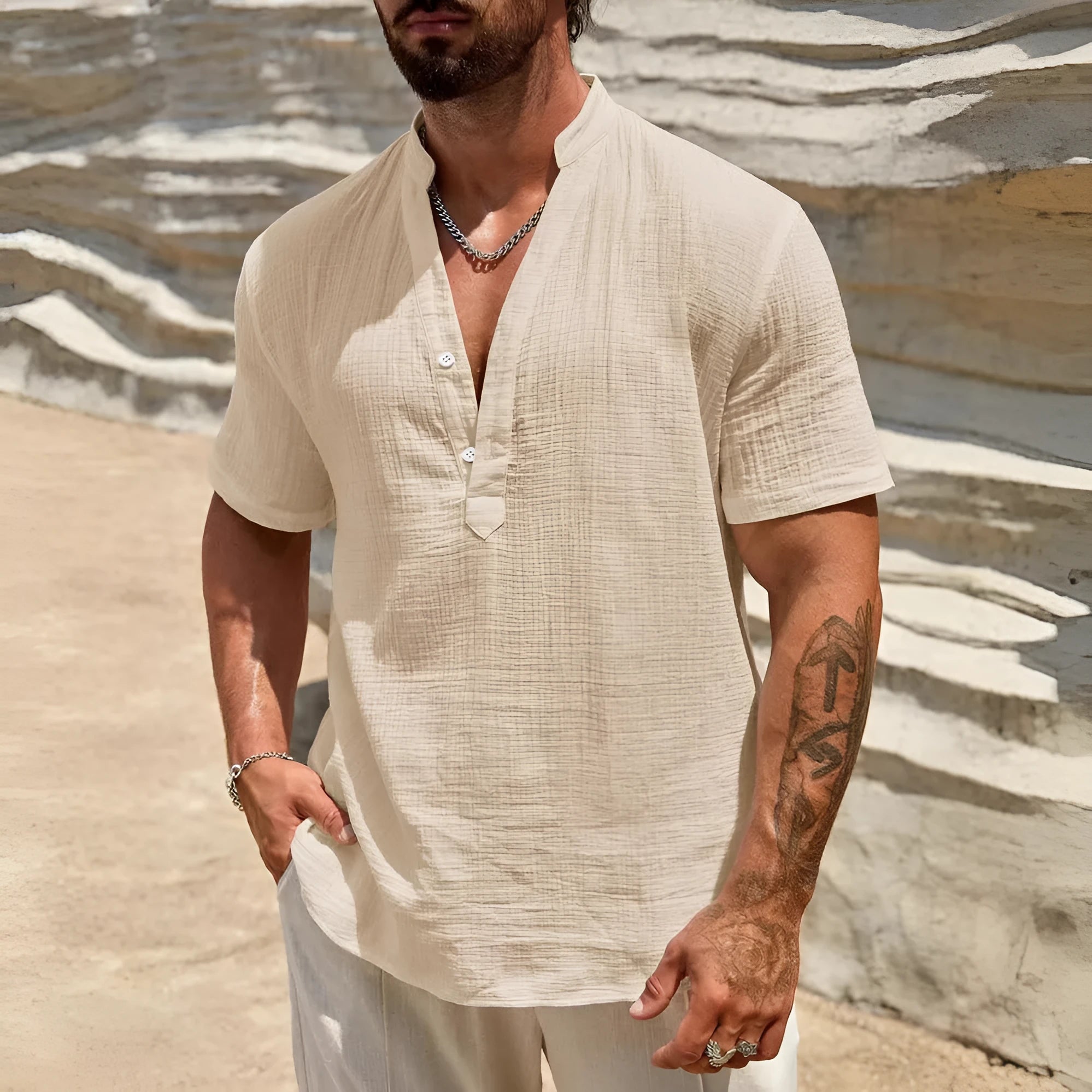 Man wearing a light blue short-sleeved stand collar shirt made from thin polyester blend fabric