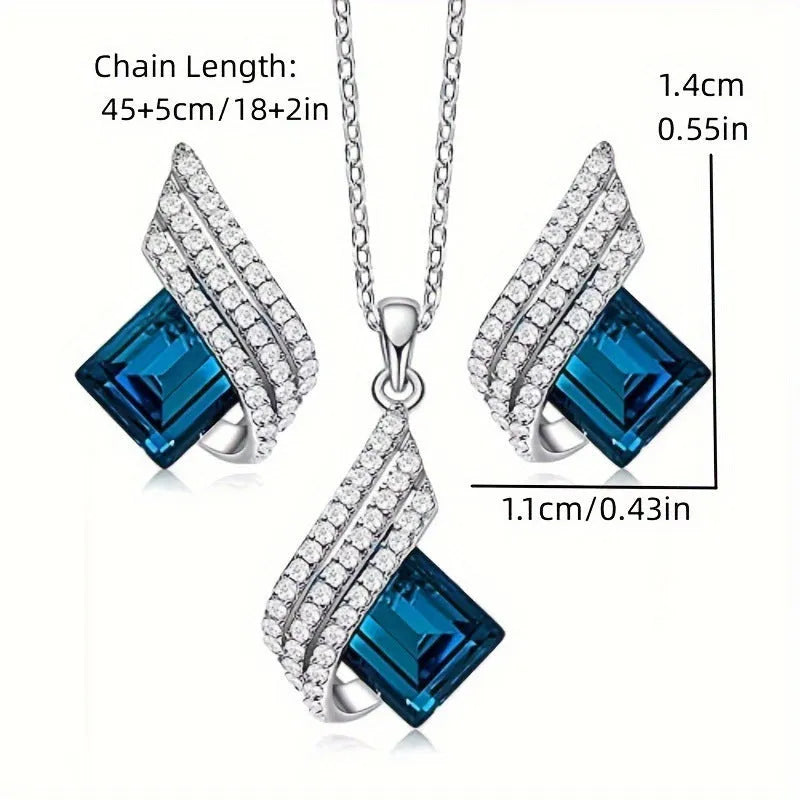Women's necklace and earring set with a glass pendant on an electroplated alloy cross chain.