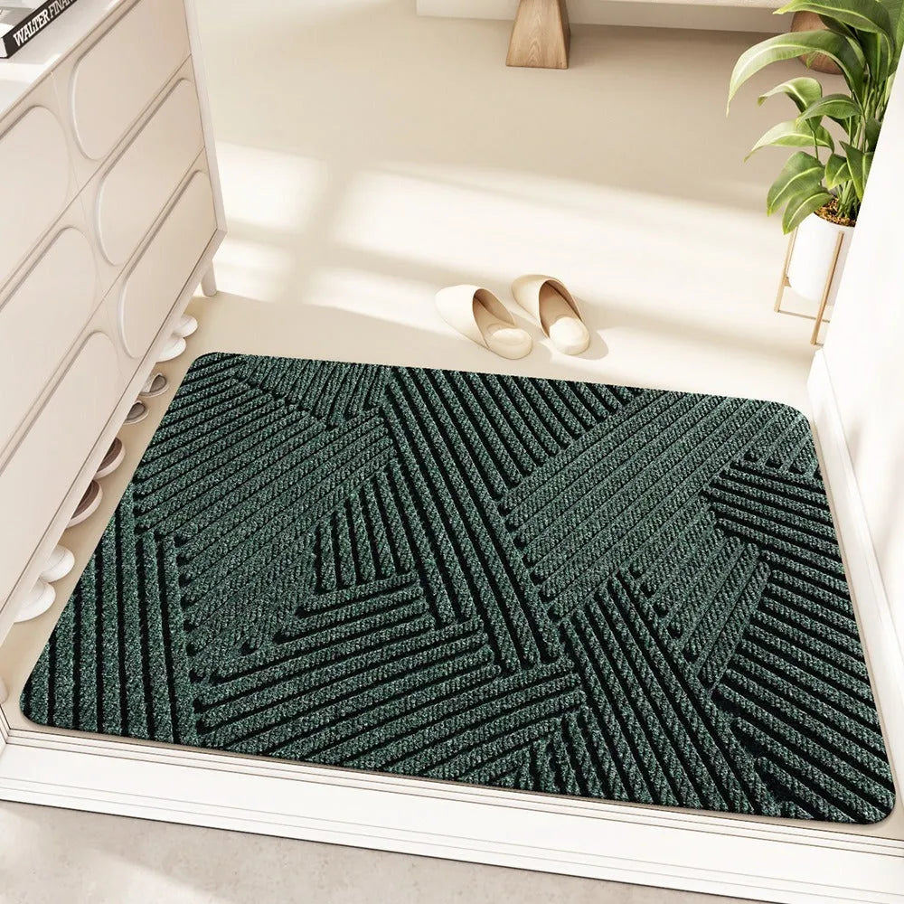 Oval green cartoon anime pattern diatom mud entrance carpet with wire ring edge, 60x90cm.