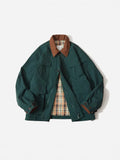 Apricot casual polyester jacket with side seam pockets on a hanger.