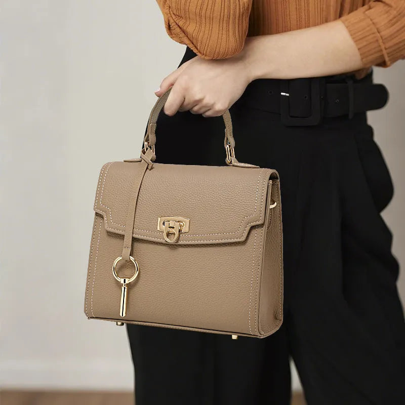 Elephant grey genuine leather handbag with litchi pattern texture and vintage lock hardware