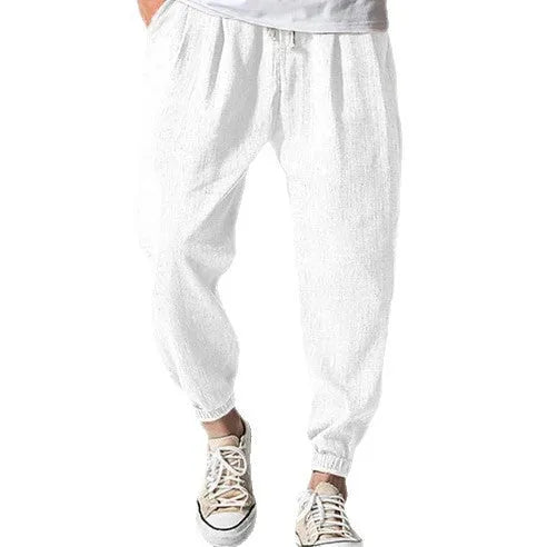 Men's loose fit cotton ankle banded casual pants in light green colour