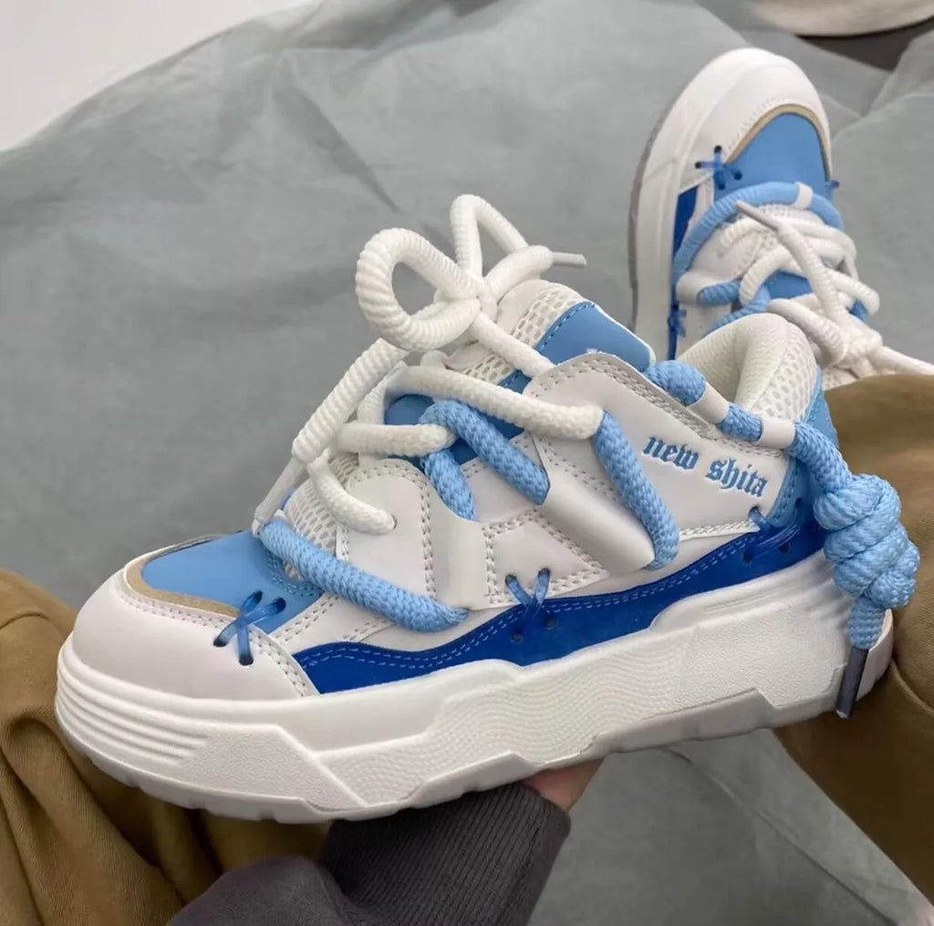 Women's grey retro platform sneakers with chunky rubber soles and 6-8cm heel height