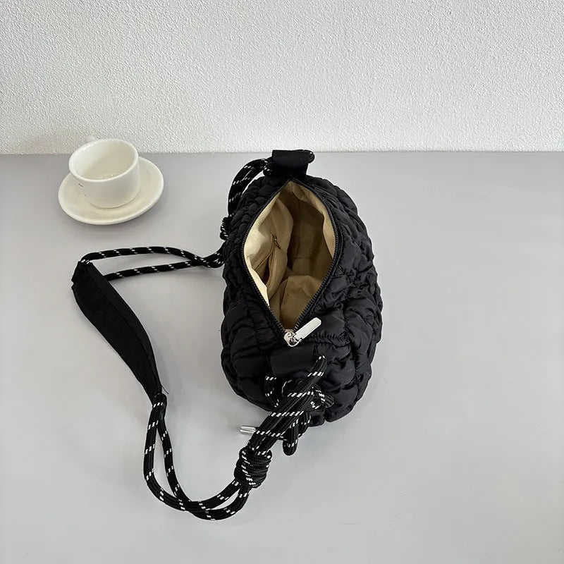 Women's lightweight nylon messenger bag in pillow shape with rhombus pattern and adjustable crossbody strap