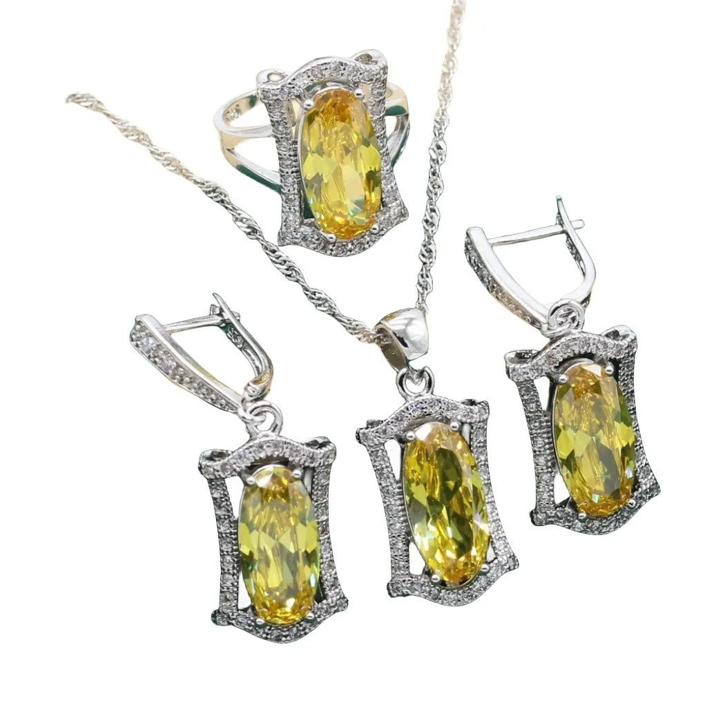 Women's olive yellow zirconia anti-allergy alloy jewellery set with necklace, earrings, ring, and bracelet.