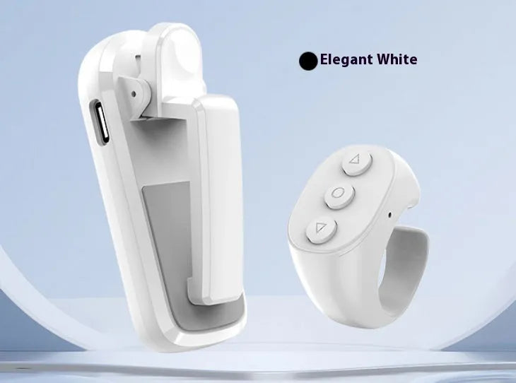 Wireless page turner remote control with clicker for e-readers and tablets in black, white, or pink colours.