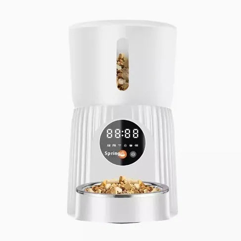 Black intelligent pet feeder with digital display showing feeding schedule
