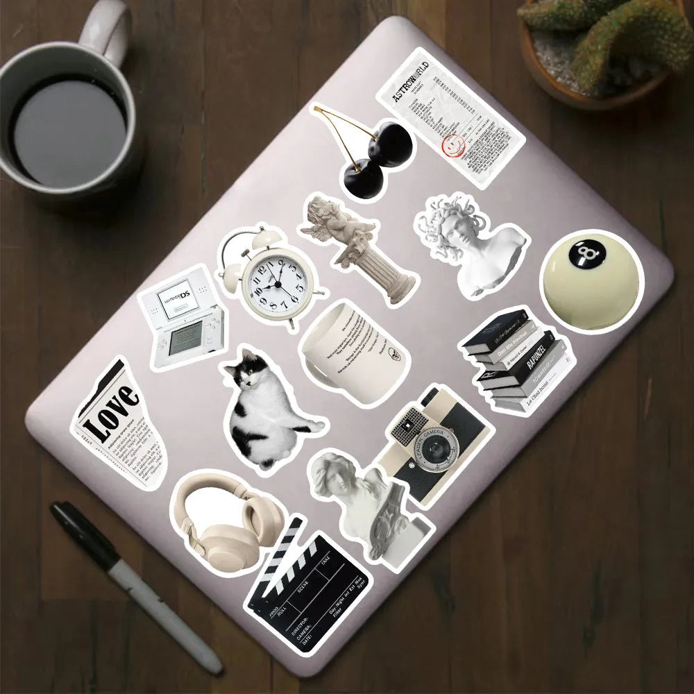 61 black and white PVC waterproof vinyl stickers for laptops, phones, and luggage.