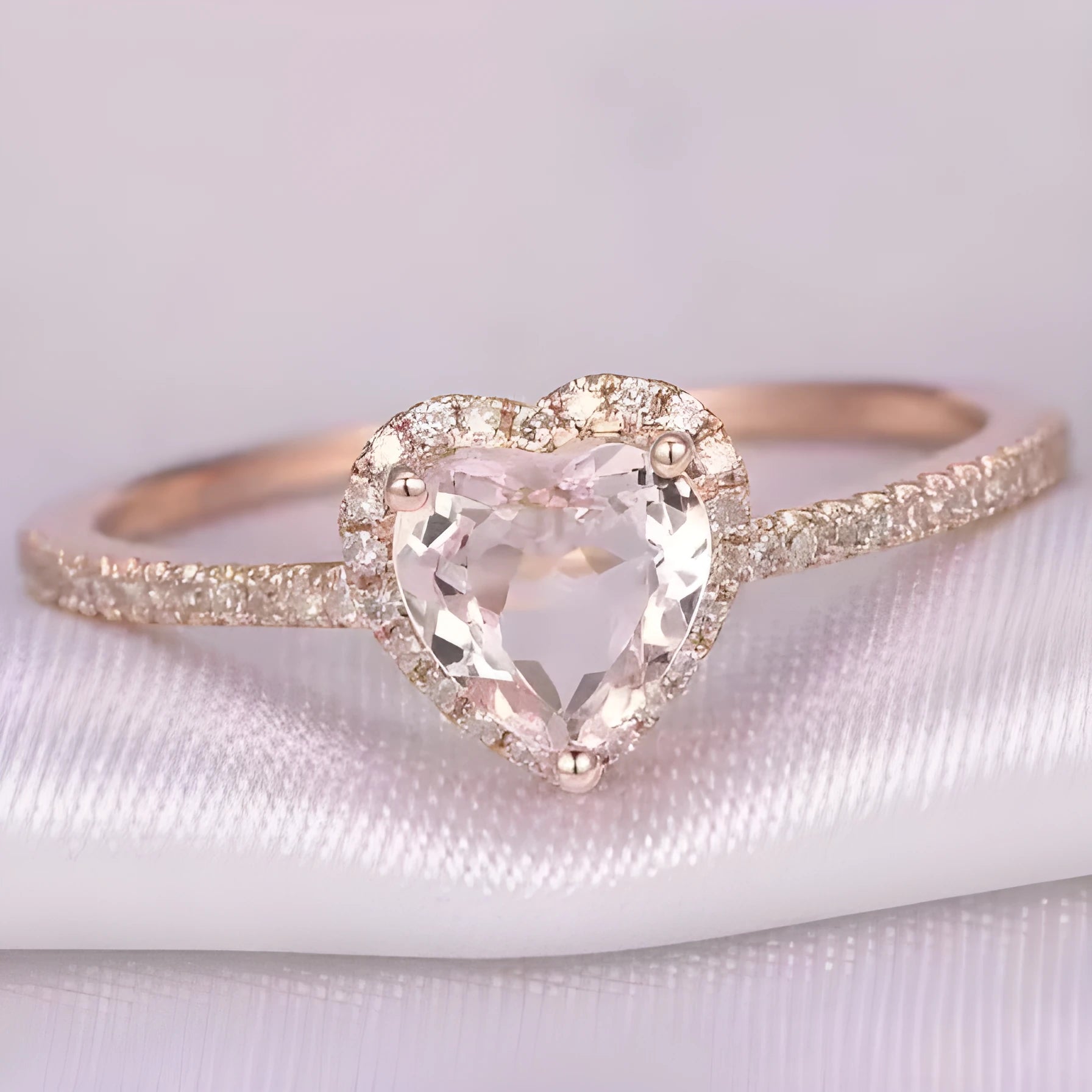 Heart-shaped crystal wedding ring with electroplated rose gold finish on white copper band