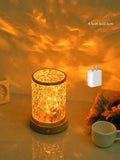 Rotating water ripple night light on solid wood base with USB port and touch controls