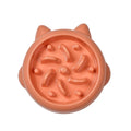 Green bone-shaped slow feeder bowl for dogs with raised maze pattern inside