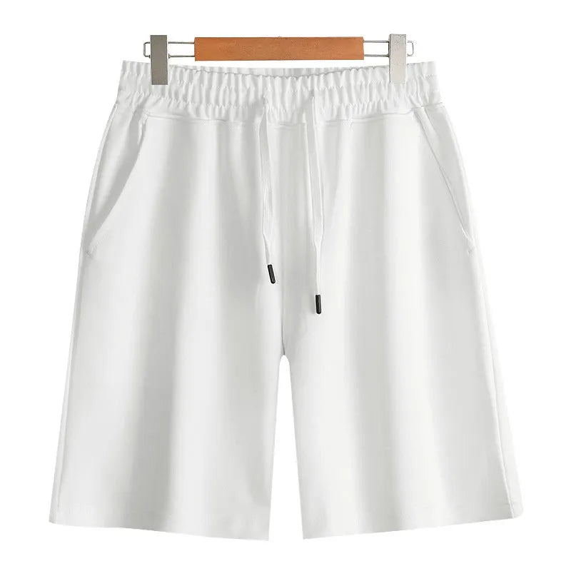 Cotton straight-leg men's shorts with elastic waistband in light grey colour.