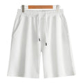 Cotton straight-leg men's shorts with elastic waistband in light grey colour.