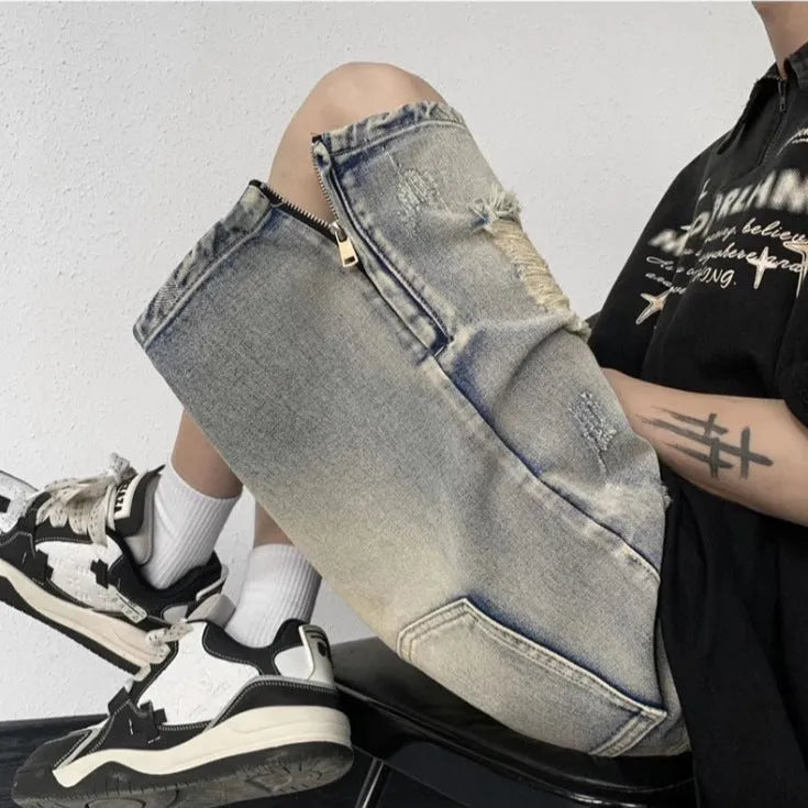 Blue retro tattered denim shorts with wide leg cut on mannequin