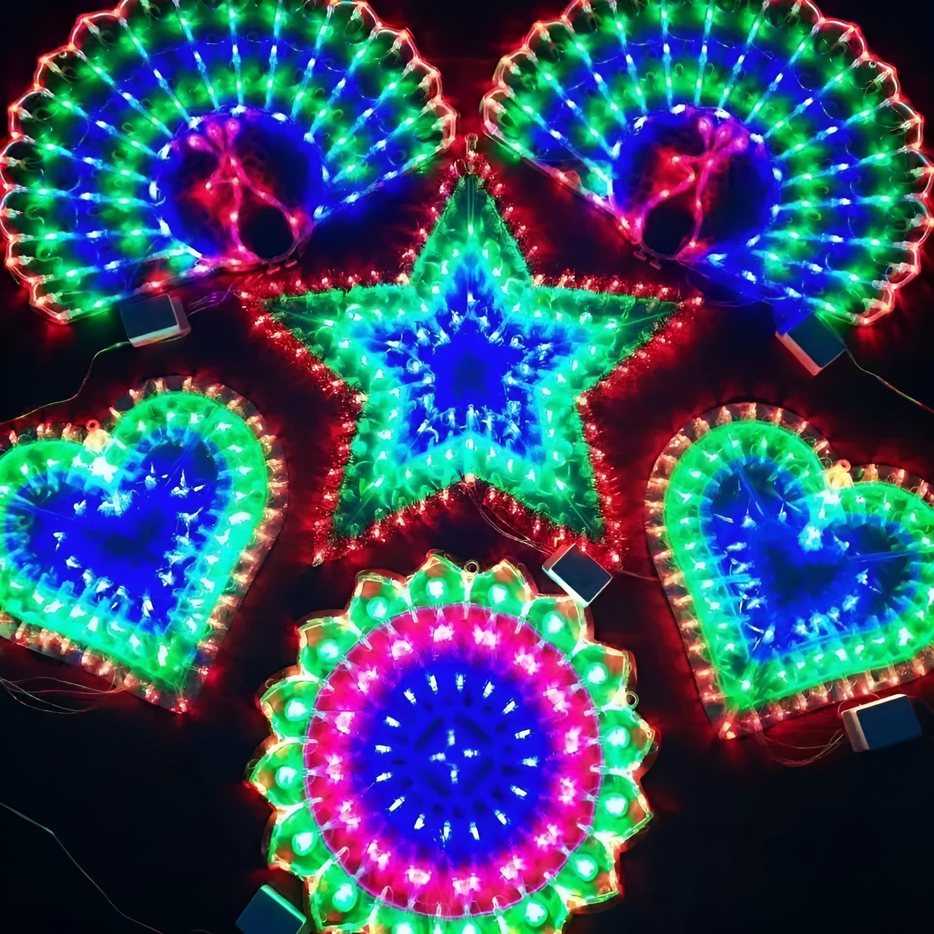 Outdoor Christmas decorative string lights with colourful patterns including peacock lamp, love heart, sunflower, and star designs
