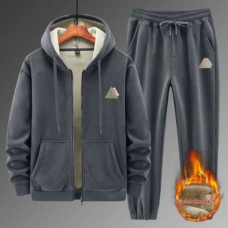 Grey men's cashmere hooded sweater and matching cotton trousers casual sports suit set on a hanger.