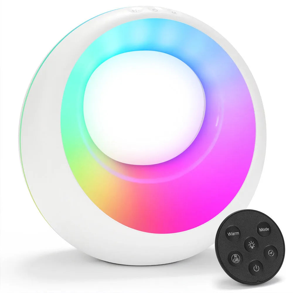 Small creative touch RGB colour changing desk lamp with remote control on a wooden surface